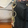 C. Wonder Women’s Jasmine Faux Straw Shoulder Bag with Bamboo-Look Handle Black - Image 8