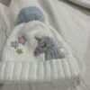 Girls unicorn hat size M one small stain can hardly see it I bet can be washed