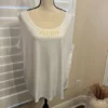 Simply beautiful sleeveless white top size 16 W it’s beautiful detail on neck