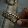One bracelet with elastic put on goldish color not too bright gold - Image 3