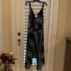 Such a pretty polka dot dress with straps and longer sides flows beautifully M
